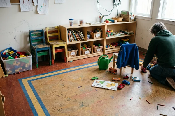 Daycare activity room in bright Marmoleum with an inlaid border detail