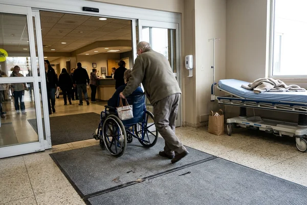Hospital entrance matting run with vinyl wiper strips handling rolling loads