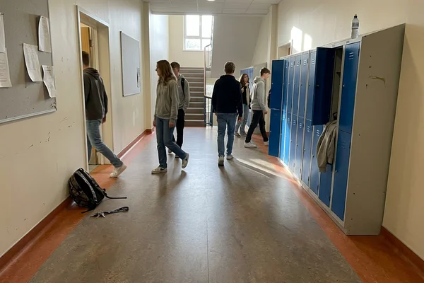 School corridor finished in natural Marmoleum with welded seams and coved skirting